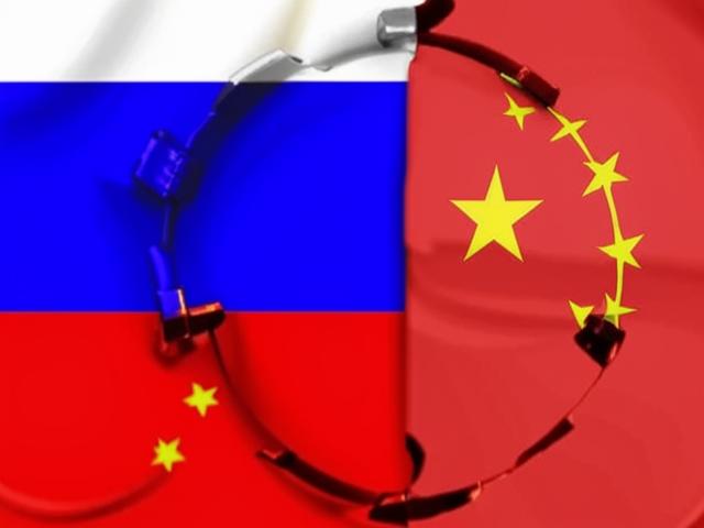 Россия и Китай договорились уменьшить количество людей в безвизовых группах до трех
